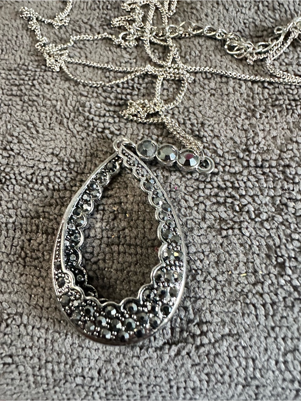 Silver Teardrop Pendant Necklace with Hematite Accents